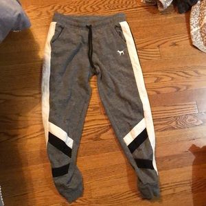 Pink Victoria’s Secret small grey sweatpants with black and white stripe